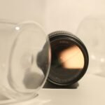 a close up of a camera lens on a table